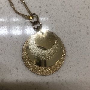 Long gold necklace